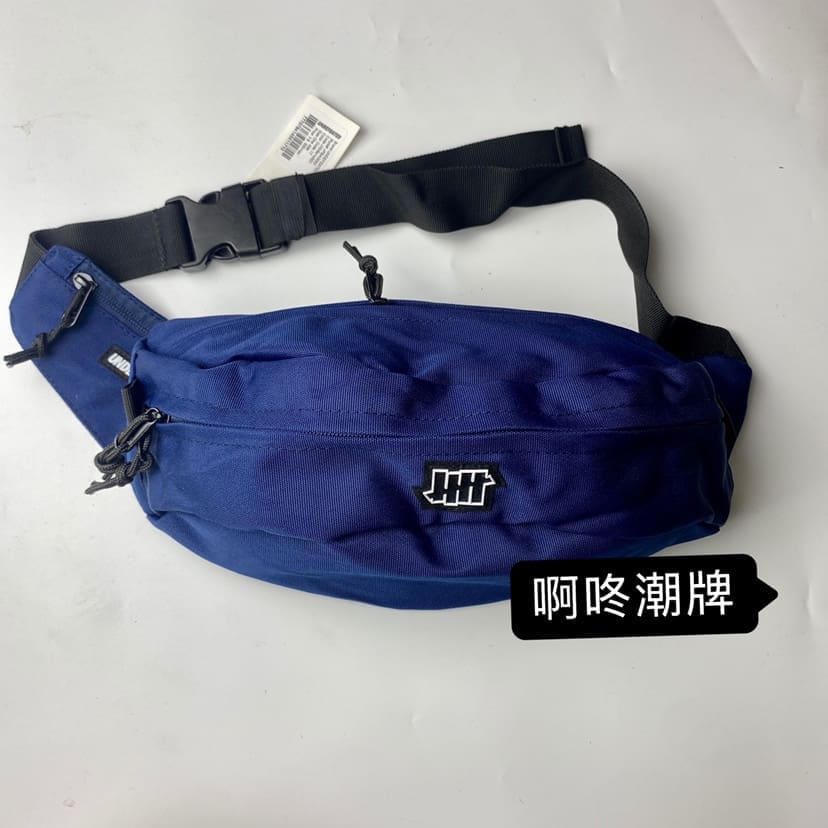 Undefeated Five-Stroke Armband Crossbody Bag